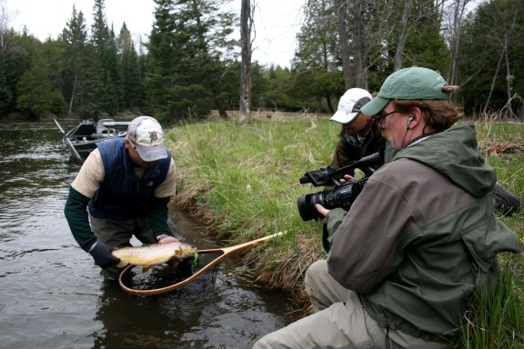 Film-maker Robert Thompson shoots a segment along the lower AuSable River for "The Brothers Brown." Courtesy photo.