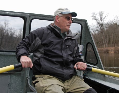 Terry Weiler controls the drift of the lures by using his oars. Photo: Howard Meyerson