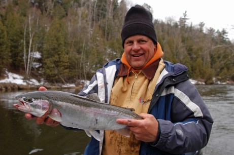 Scott Dixon lands a smaller steelhead.