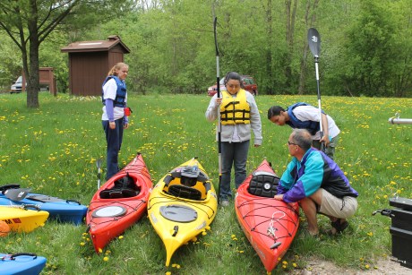 Jeff Neumann introduces a group of Grand Rapids Community College students to their first experience kayaking on the Grand River. Photo: Mark Neumann