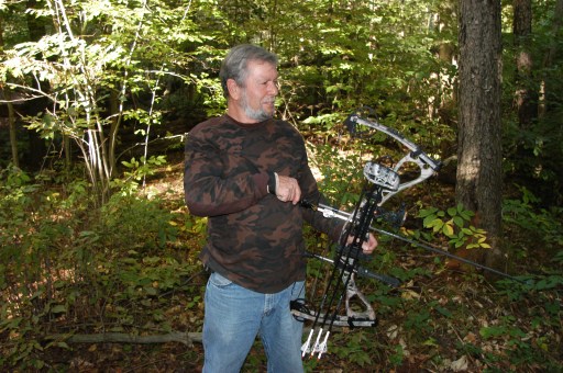 Mike Kotecki gets ready to draw on a target while practicing. Photo: Howard Meyerson