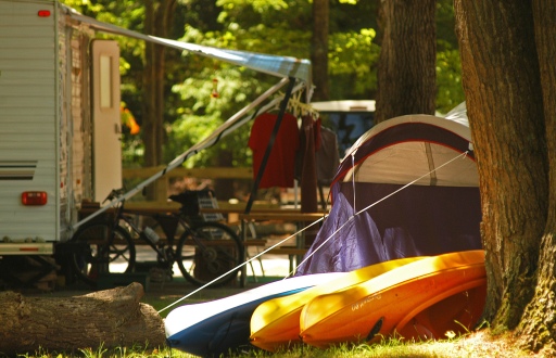 Families came with tents trailers and kayaks to enjoy the scenery at Ludington State Park. Photo: Howard Meyerson