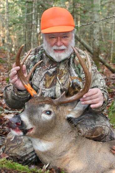Author Richard P. Smith, a long time hunter, poses took this nice 8-point buck during the 2012 season while scrape hunting. 