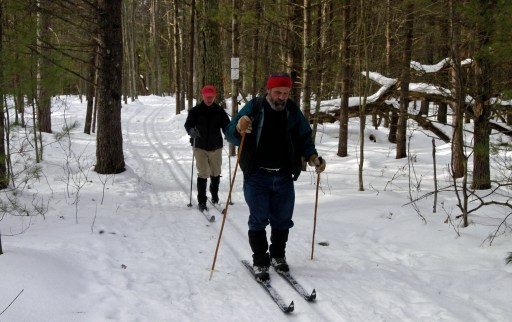 Applying glide wax to the tips and tails of no-wax skis will enhance their peformance. Photo: Howard Meyerson