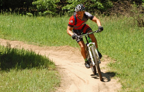 An area rider enjoys the 9-mile trail at Kent County's Luton Park, built by West Michigan Mountain Biking Alliance members. Photo: Howard Meyerson
