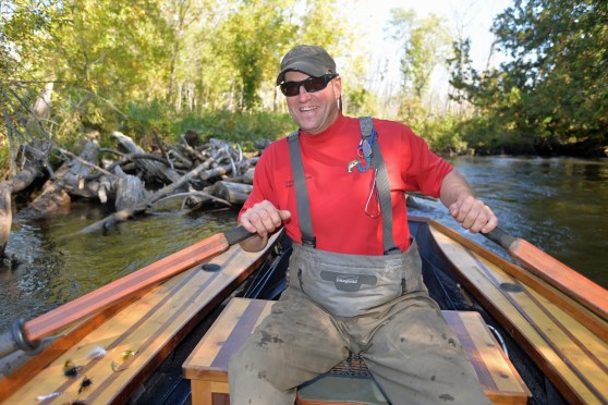 Phil Croff enjoys rowing his boats on the swifter, smaller northern Michigan streams. Photo: Howard Meyerson