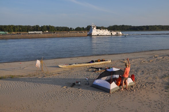 Day 48: While camped on the banks just south of Carutherville, MO, the crew of the upriver-bound Amy Francis blow the ship's horn in greeting and come out and wave. Linda De Kock waves back. Photo: Gary De DeKock. 