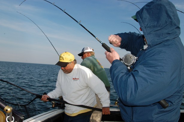 The salmon fishing action on Lake Michigan was sporadic in 2014. Anglers shown here on Sea Hawk Charters out of St. Joseph, had a good early season day in June before fishing slowed down on Lake Michigan. Photo: Howard Meyerson