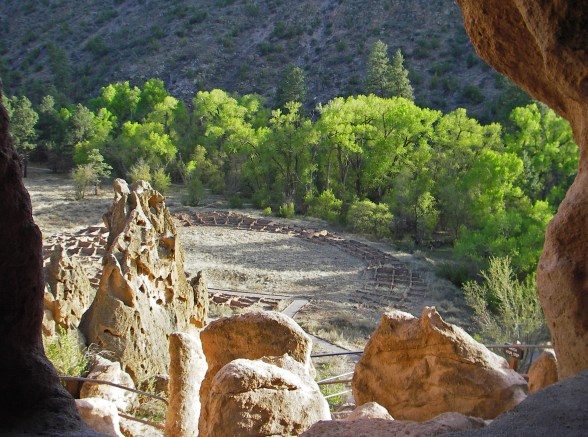 Looking out from one of the cliff dwellings at the remnants of the circular pueblo dwellings where a community of people once lived. Photo: Howard Meyerson