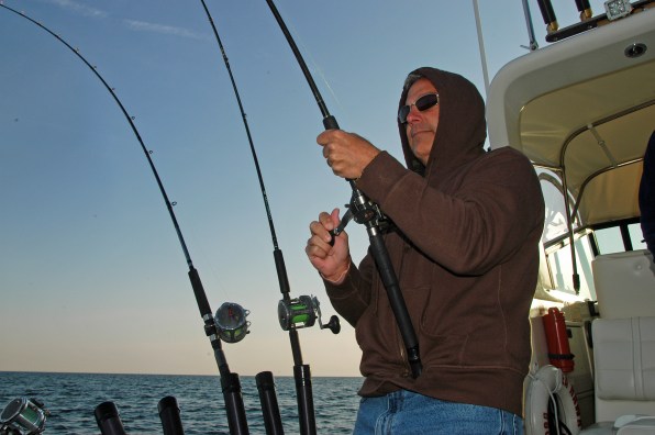 Anglers can anticipate catching salmon again this summer, though the Lake Michigan alewife population remains at an all-time low. Photo: Howard Meyerson.