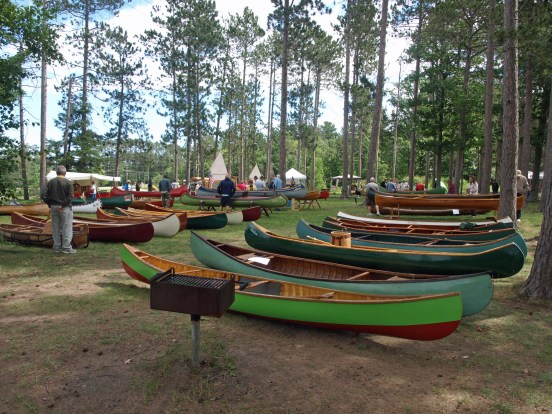 An assortment of wooden canoes like these shown at the WCHA Regional Assembly in Marquette in 2013 will be on display this year. Photo courtesy of WCHA